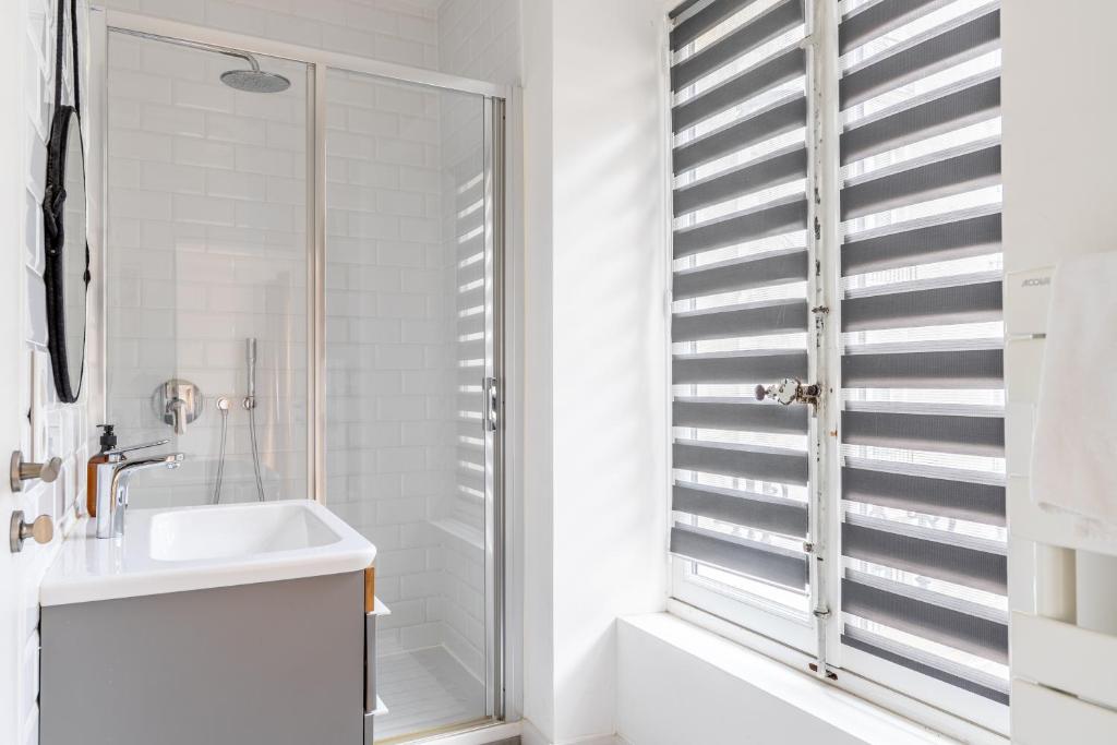Second bathroom — shower, white subway tile